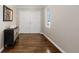 Inviting foyer with gleaming hardwood floors, a stylish console table, and a bright window at 172 S Forest St, Denver, CO 80246