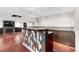 Spacious living room featuring a stylish bar area, recessed lighting, and hardwood floors at 172 S Forest St, Denver, CO 80246