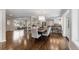 Spacious living room featuring beautiful hardwood floors, neutral walls and a decorative rug at 172 S Forest St, Denver, CO 80246