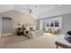 Spacious main bedroom with carpeted floor and a stylish ceiling fan at 172 S Forest St, Denver, CO 80246