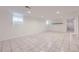 Spacious basement with tile floors, recessed lighting, and a small window at 8471 Rainbow Ave, Denver, CO 80229