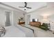 Serene bedroom featuring a tray ceiling, soft lighting, and minimalist decor at 13633 Mariposa St, Broomfield, CO 80023