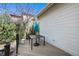 Deck with table, umbrella and black metal railings at 13633 Mariposa St, Broomfield, CO 80023