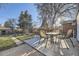 Private backyard with patio and mature trees at 8340 W 70Th Ave, Arvada, CO 80004