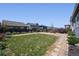 Large backyard with beautiful landscaping, gravel, stone pavers, and fencing at 27130 E Maple Ave, Aurora, CO 80018