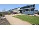 Spacious backyard with a combination of grass and gravel, ideal for outdoor activities at 27130 E Maple Ave, Aurora, CO 80018
