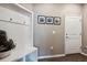 Mudroom entryway featuring hooks, built in bench, and natural light at 27130 E Maple Ave, Aurora, CO 80018