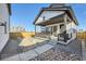 This backyard features low maintenance gravel landscaping and a covered patio, perfect for relaxing outdoors at 307 W Charles St, Superior, CO 80027