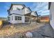Modern home featuring a backyard with low maintenance gravel, a covered patio, and lush landscaping at 307 W Charles St, Superior, CO 80027