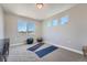 Cozy bedroom with natural light, featuring a yoga mat, exercise balls, and neutral tones at 307 W Charles St, Superior, CO 80027