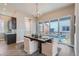 Bright dining area with modern chandelier and sliding glass doors to outdoor patio at 307 W Charles St, Superior, CO 80027