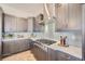 Gourmet kitchen featuring stainless steel appliances, sleek countertops, and modern cabinetry at 307 W Charles St, Superior, CO 80027