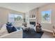 Inviting living room featuring a modern fireplace and large windows for natural light at 307 W Charles St, Superior, CO 80027