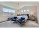 Serene main bedroom with vaulted ceiling, ample natural light, and stylish decor at 307 W Charles St, Superior, CO 80027