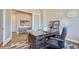 Functional office featuring a spacious desk, comfortable seating, and elegant decor for a productive workspace at 307 W Charles St, Superior, CO 80027