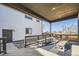 Cozy covered patio with stylish seating, perfect for outdoor dining and entertaining at 307 W Charles St, Superior, CO 80027