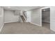 Finished basement with carpet and access to stairs and other rooms at 7882 S Independence Way, Littleton, CO 80128