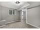 Finished basement includes carpet, window, and access to other rooms at 7882 S Independence Way, Littleton, CO 80128