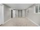 Spacious basement with carpet and access to other rooms at 7882 S Independence Way, Littleton, CO 80128