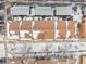 Aerial view of townhome roofs and surrounding area at 12644 W Virginia Ave, Lakewood, CO 80228