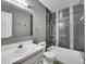 Bathroom with tub, shower, and updated vanity at 12644 W Virginia Ave, Lakewood, CO 80228