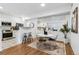 Bright dining area connected to the kitchen, featuring modern seating and stylish decor at 1861 Mallard Dr, Superior, CO 80027