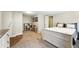 This bedroom features neutral paint and carpet with furniture included at 1155 N Ash St # 102, Denver, CO 80220