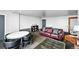 A spacious living room with comfortable seating arrangements at 1155 N Ash St # 102, Denver, CO 80220