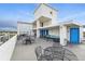 Inviting rooftop deck offers ample seating and access to amenities at 1155 N Ash St # 102, Denver, CO 80220