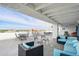 Spacious rooftop deck with comfortable seating and beautiful city views at 1155 N Ash St # 102, Denver, CO 80220