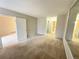 Bedroom with neutral walls and carpeting at 14751 E Tennessee Dr # 213, Aurora, CO 80012