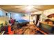 Basement rec room with a pool table and vintage-inspired decor at 8338 Charles Way, Denver, CO 80221