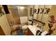 Functional bathroom with a tub, sink, toilet and plenty of storage at 8338 Charles Way, Denver, CO 80221