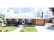 Charming brick home featuring a well-maintained front yard and driveway at 8338 Charles Way, Denver, CO 80221