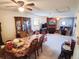 Spacious open floorplan living room with dining area, featuring a fireplace at 8338 Charles Way, Denver, CO 80221