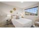 Inviting bedroom features stylish decor, a large window, and a comfortable setting at 12827 W Burgundy Pl, Littleton, CO 80127
