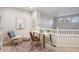 Cozy home office nook with a stylish desk and a comfortable seating area at 12827 W Burgundy Pl, Littleton, CO 80127