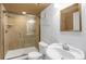 Basement bathroom with shower stall, toilet and vanity at 9441 Wolfe St, Highlands Ranch, CO 80129