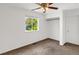 Spacious bedroom with a closet and window at 9441 Wolfe St, Highlands Ranch, CO 80129