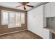 Bedroom with built-in cabinets and window shutters at 9441 Wolfe St, Highlands Ranch, CO 80129