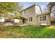 Two-story house with backyard patio and landscaping at 9441 Wolfe St, Highlands Ranch, CO 80129