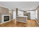 Kitchen features white cabinets, stainless steel appliances, and hardwood floors at 9441 Wolfe St, Highlands Ranch, CO 80129