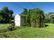 Backyard with a shed and overgrown vegetation at 5680 W 41St Ave, Wheat Ridge, CO 80212