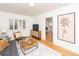Bright living room featuring hardwood floors and a trendy design at 5680 W 41St Ave, Wheat Ridge, CO 80212