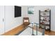 Well-lit office with hardwood floors and natural light, complete with stylish decor at 5680 W 41St Ave, Wheat Ridge, CO 80212