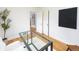 Bright office featuring hardwood floors, and natural light, and stylish decor at 5680 W 41St Ave, Wheat Ridge, CO 80212