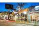 Bustling street view of the community's shopping and dining district at night, showcasing vibrant local businesses at 5680 W 41St Ave, Wheat Ridge, CO 80212