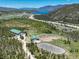 Picturesque equestrian facility showcasing outdoor riding arena, barns, and scenic views, with easy access to nearby town at 300 Gold Hill Rd, Breckenridge, CO 80424