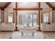 Elegant bathroom featuring a freestanding tub, dual vanities, and natural light from a large window at 300 Gold Hill Rd, Breckenridge, CO 80424