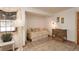 Bedroom with floral linens, a desk, neutral walls, and decorative furniture at 300 Gold Hill Rd, Breckenridge, CO 80424